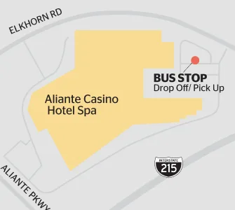 Map showing Aliante Casino Hotel Spa near Aliante Pkwy and Elkhorn Rd, with a marked bus stop for drop off and pick up located northeast of the building, near the parking lot. Interstate 215 appears at the bottom.